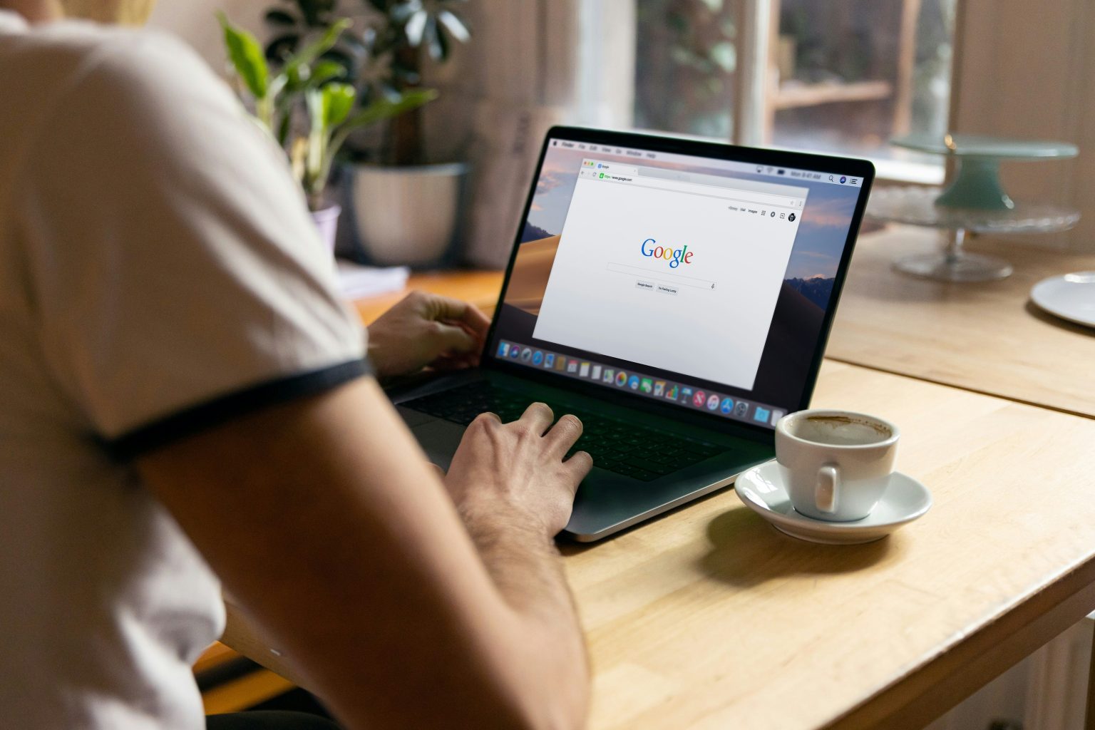 Someone using Google Search results on their laptop.