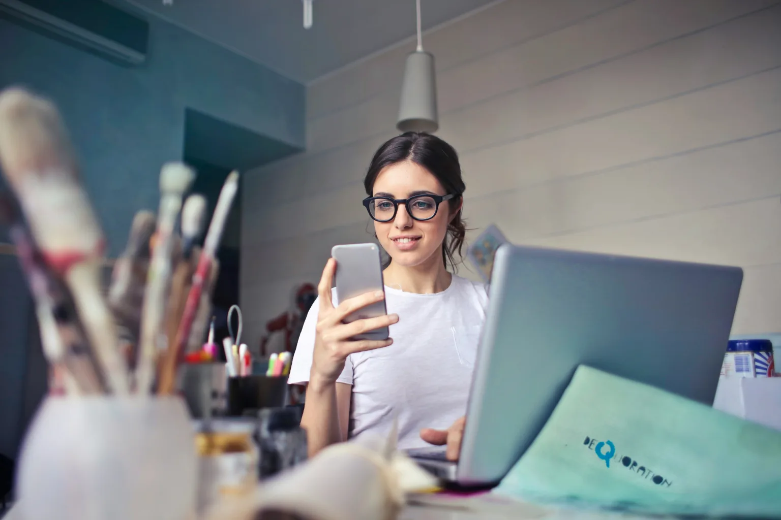 A woman looking at her phone.