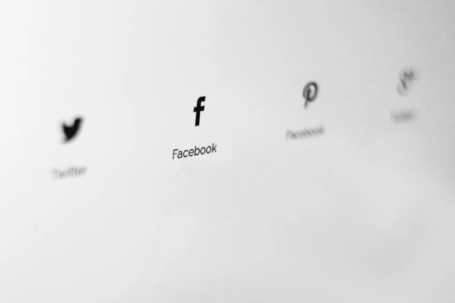 The Facebook logo on a computer screen.