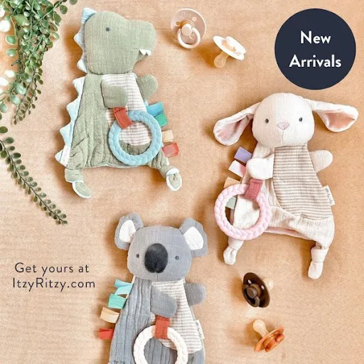 An Itzy Ritzy ad displaying stuffed animals. 